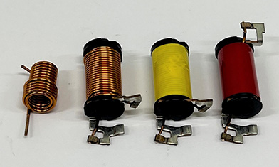 Coil for circuit breakers